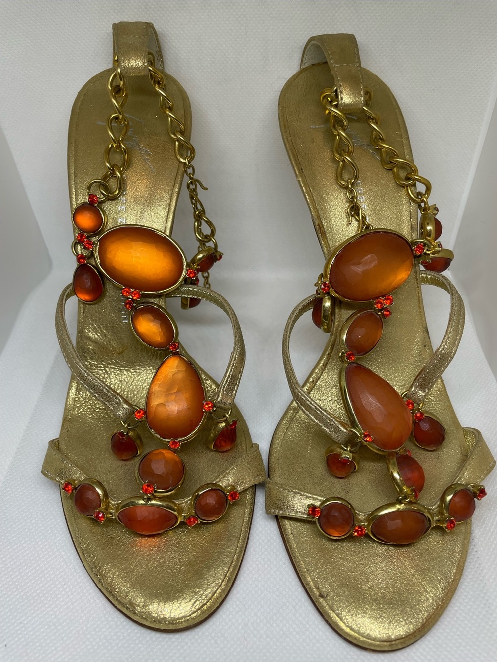 Giuseppe Zanotti Gold Sandals with Orange Gem Accents